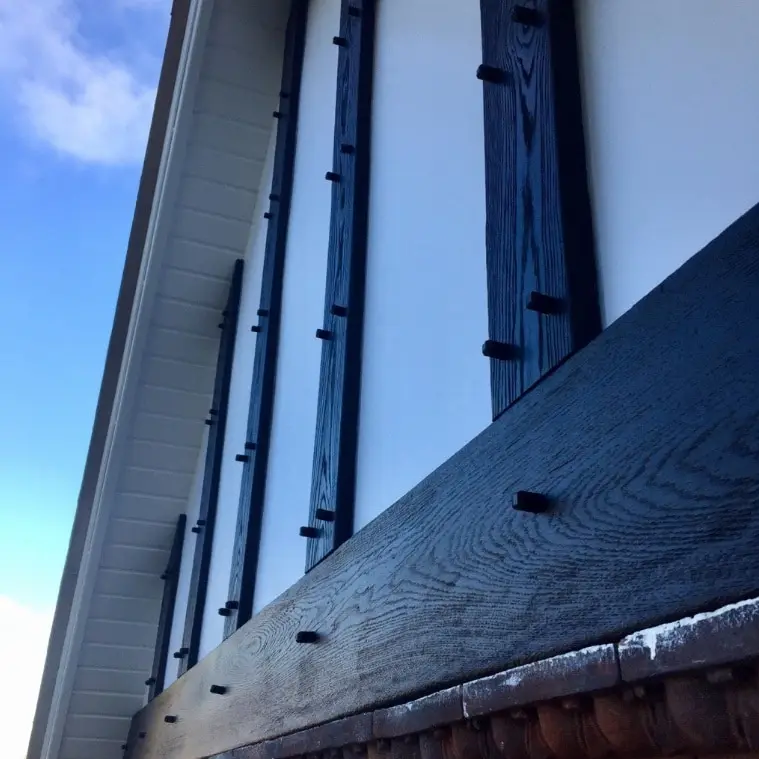 Black and white example of our mock tudor boards on a house